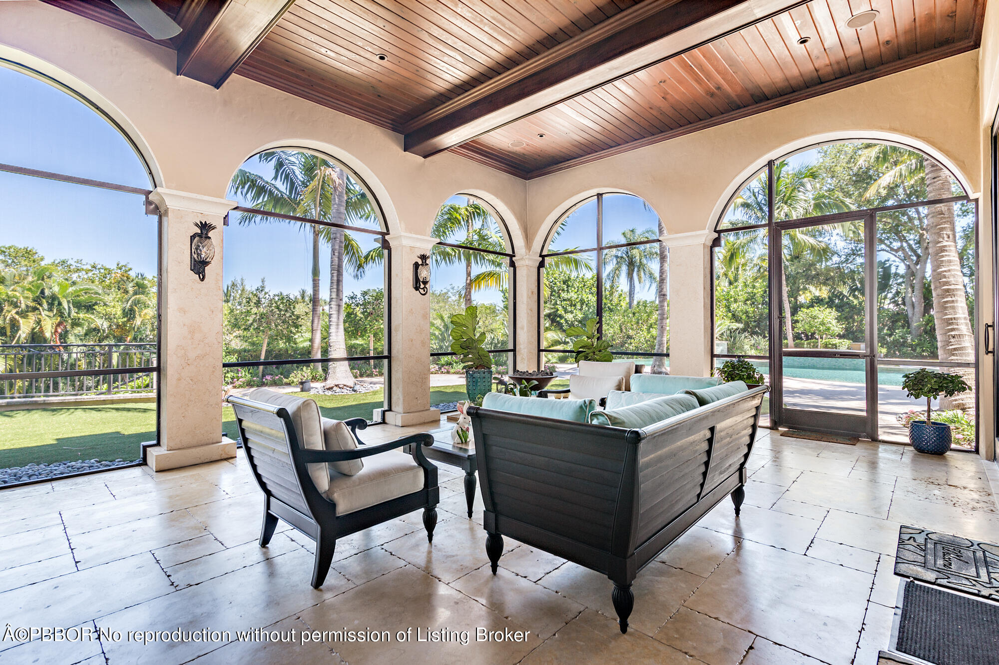 12358 Ridge Road North Palm Beach, FL 33408 - Photo 24 of 36 a living room with furniture and a large window