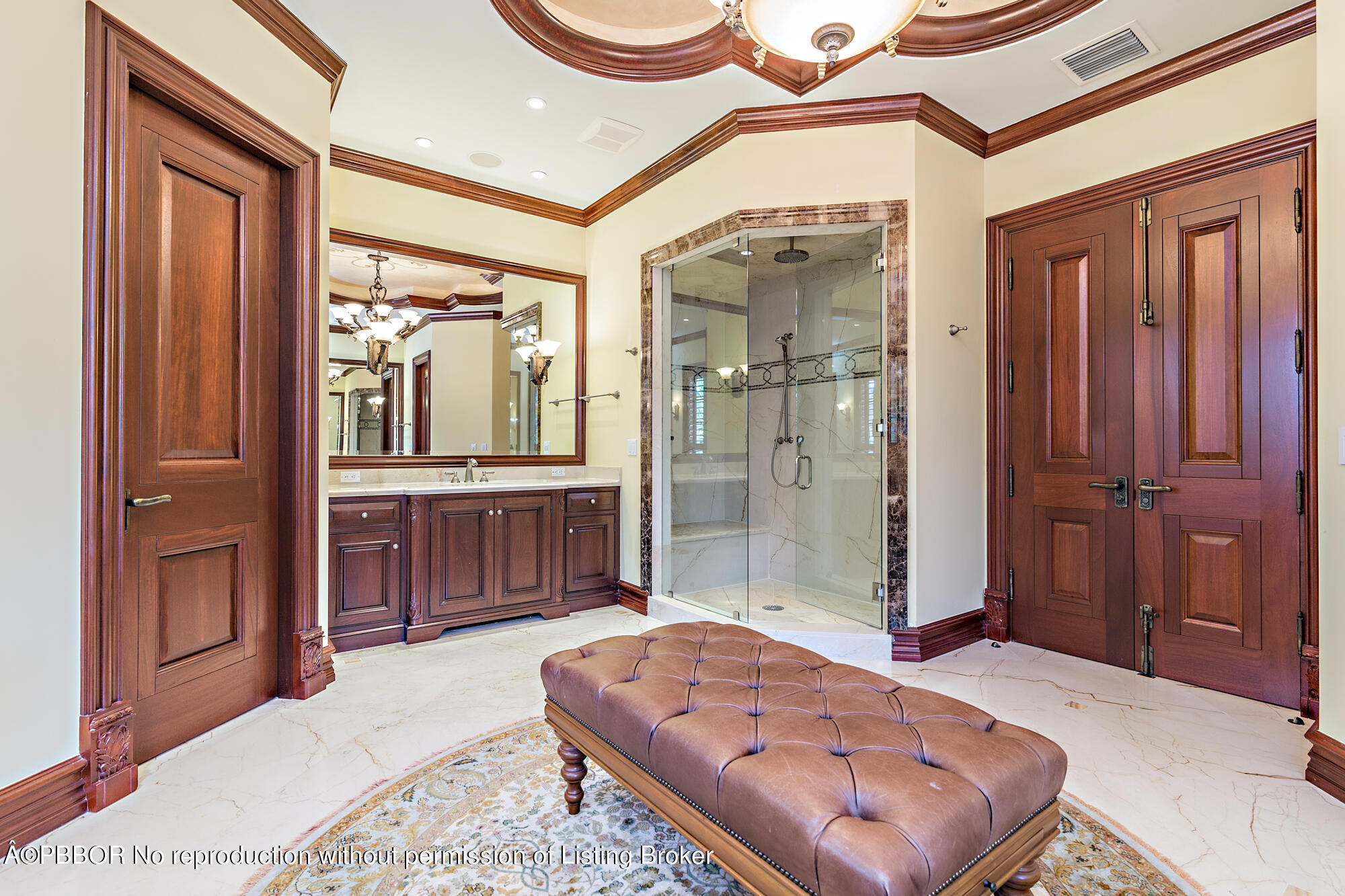 12358 Ridge Road North Palm Beach, FL 33408 - Photo 30 of 36 a bedroom with a bed closet and a mirror