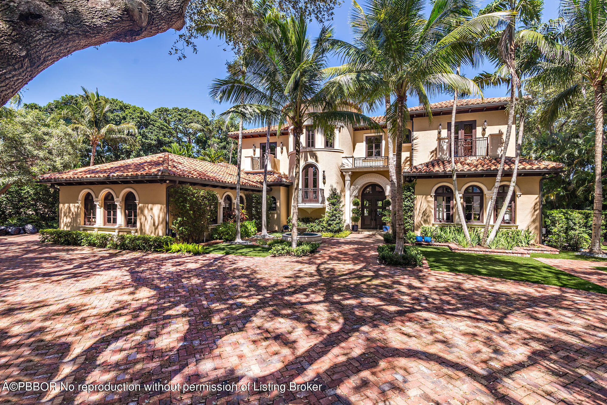 12358 Ridge Road North Palm Beach, FL 33408 - Photo 3 of 36 a front view of a house with garden