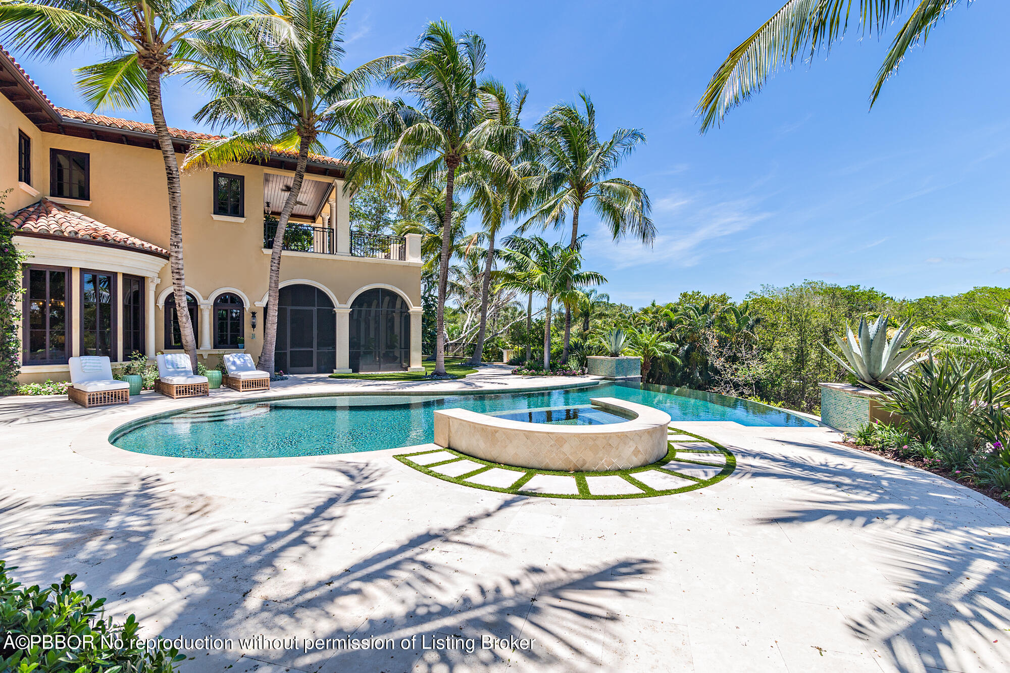 12358 Ridge Road North Palm Beach, FL 33408 - Photo 6 of 36 a swimming pool with outdoor seating and yard