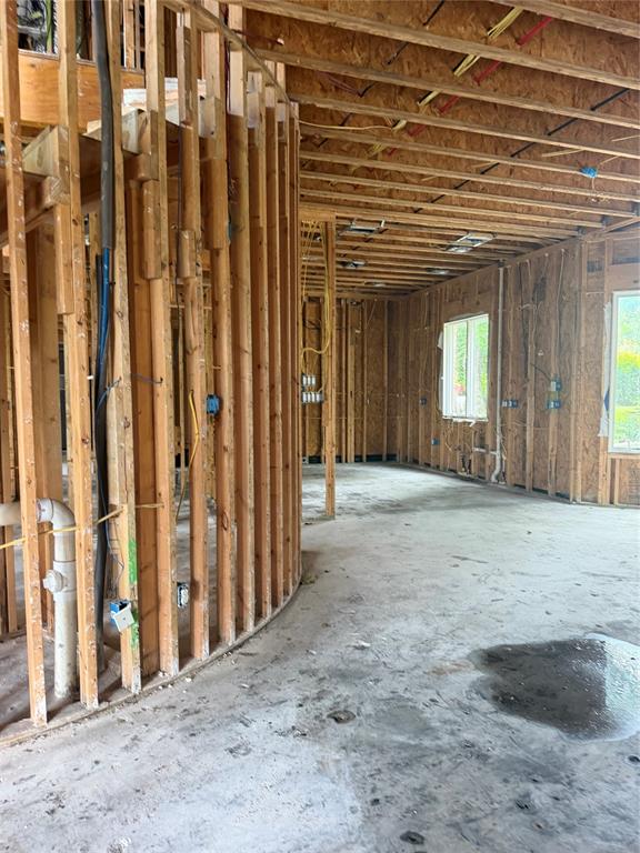83 Bass Road Pottsboro, TX 75076 - Photo 26 of 31 New construction framing showcasing structural integrity and a curved wall design