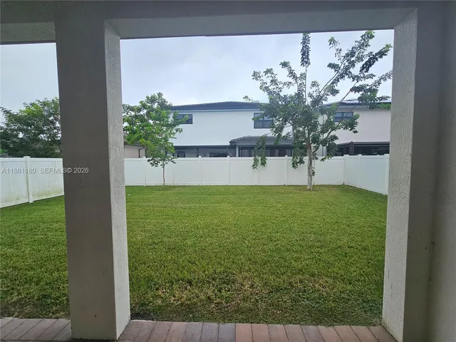 a view of a porch with a yard