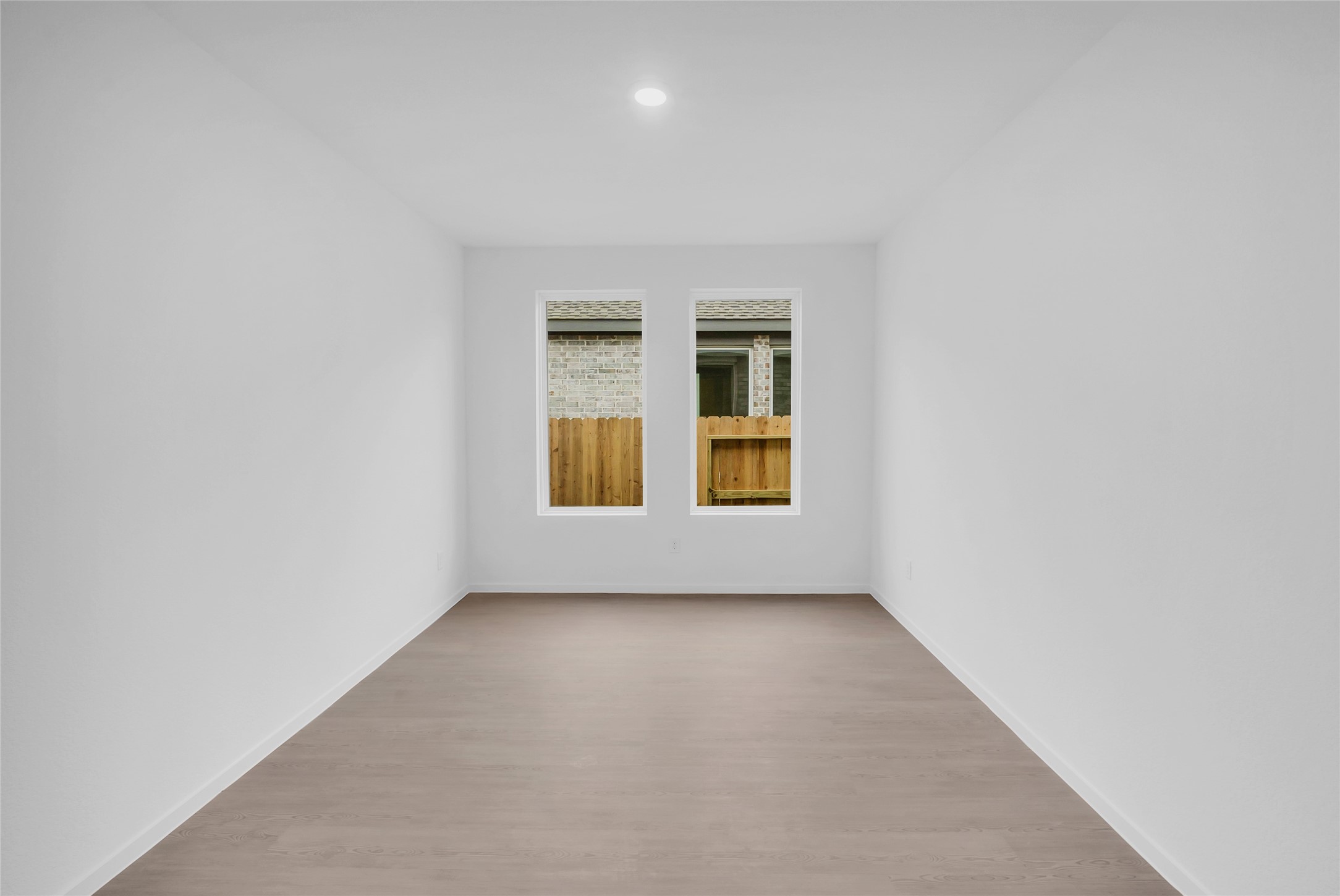 213 Orchard Cove Snook, TX 77879 - Photo 6 of 16 an empty room with windows