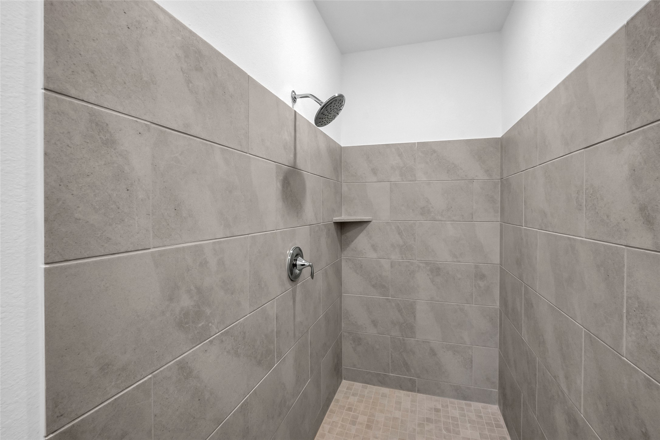 213 Orchard Cove Snook, TX 77879 - Photo 8 of 16 a bathroom with a shower