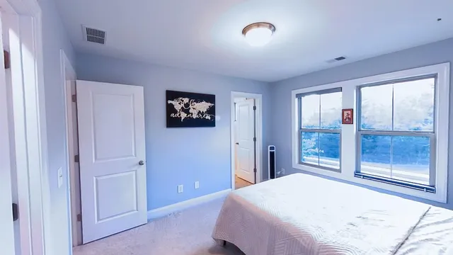 a view of a storage & utility room with a window