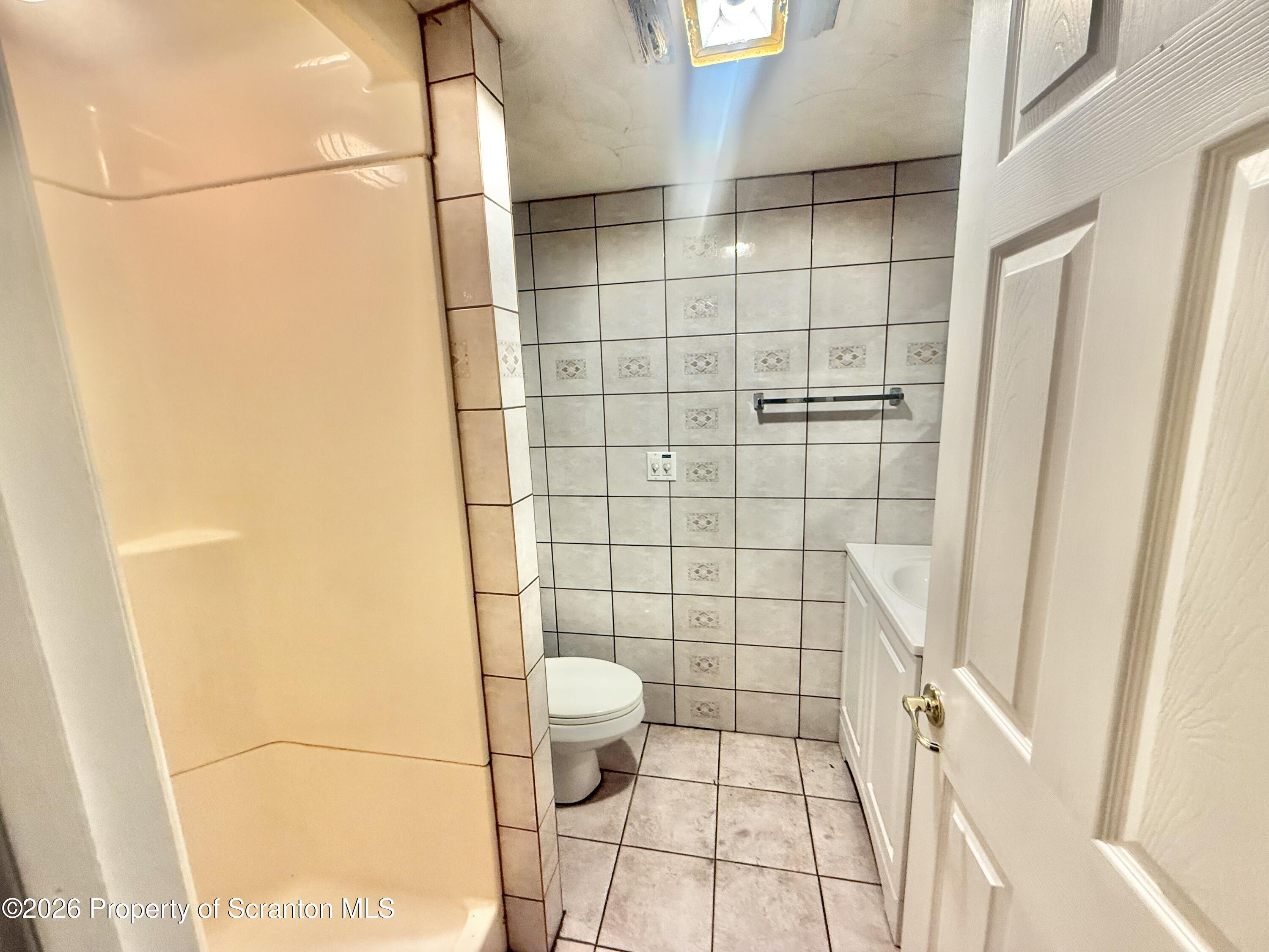 1301 Main Street, Unit 7 Dickson City, PA 18519 - Photo 7 of 7 a bathroom with a shower