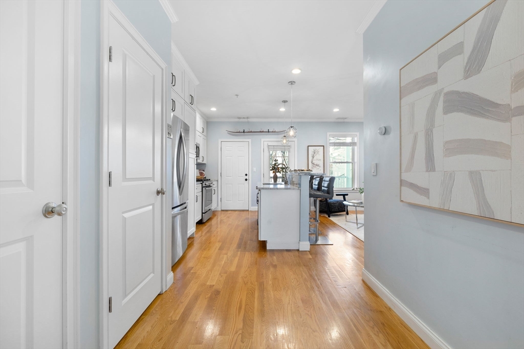 242 West Fifth Street, Unit 3 Boston, MA 02127 - Photo 14 of 37 a view of a living room with wooden floor