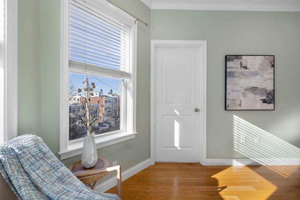 242 West Fifth Street, Unit 3 Boston, MA 02127 - Photo 19 of 37 a bedroom with furniture and a window