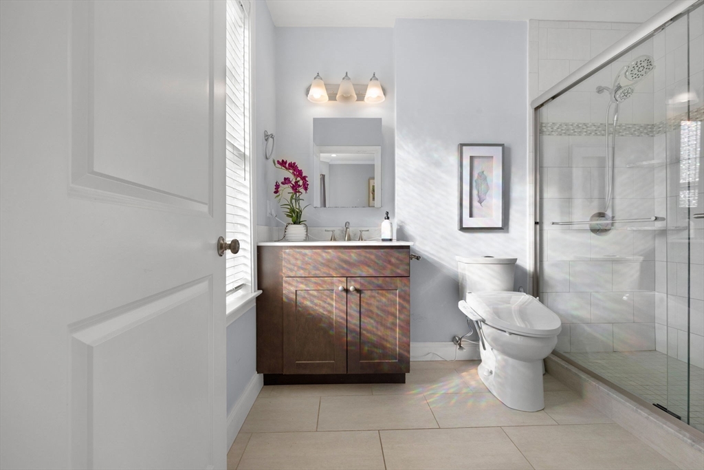 242 West Fifth Street, Unit 3 Boston, MA 02127 - Photo 23 of 37 a bathroom with a sink toilet and shower