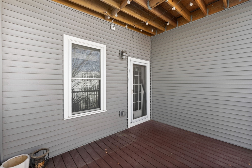 242 West Fifth Street, Unit 3 Boston, MA 02127 - Photo 29 of 37 a view of a room with wooden walls