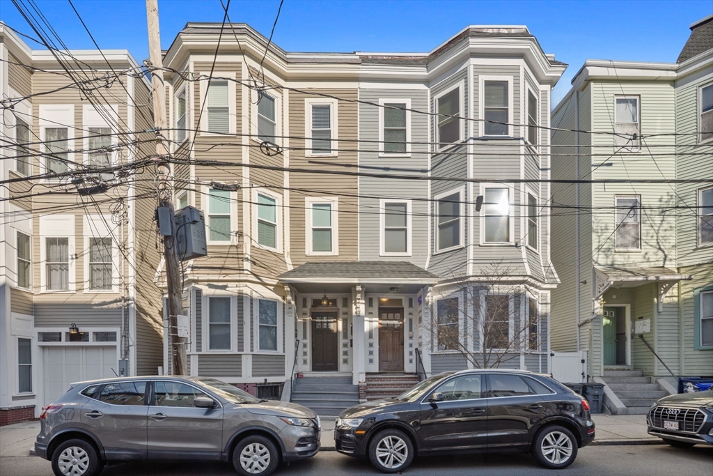 242 West Fifth Street, Unit 3 Boston, MA 02127 - Photo 31 of 37 a car parked in front of a building