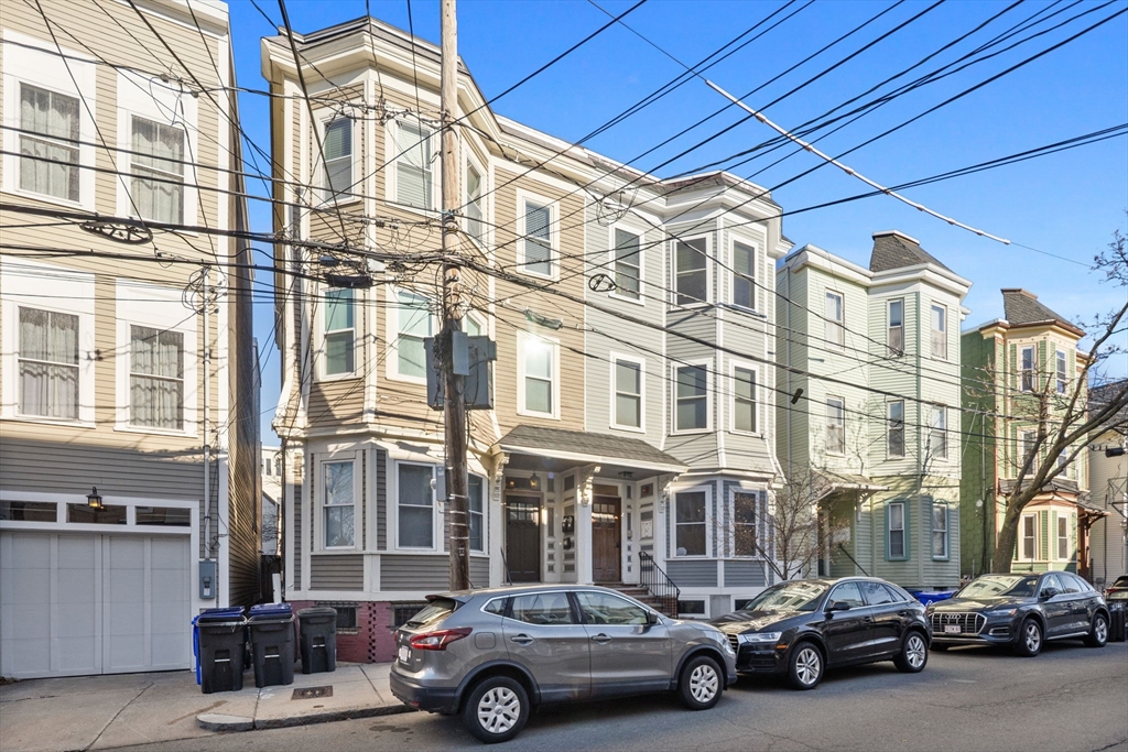 242 West Fifth Street, Unit 3 Boston, MA 02127 - Photo 32 of 37 a car parked in front of a building