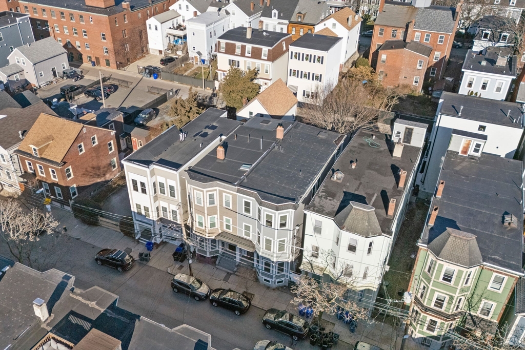 242 West Fifth Street, Unit 3 Boston, MA 02127 - Photo 34 of 37 an aerial view of a building with parking