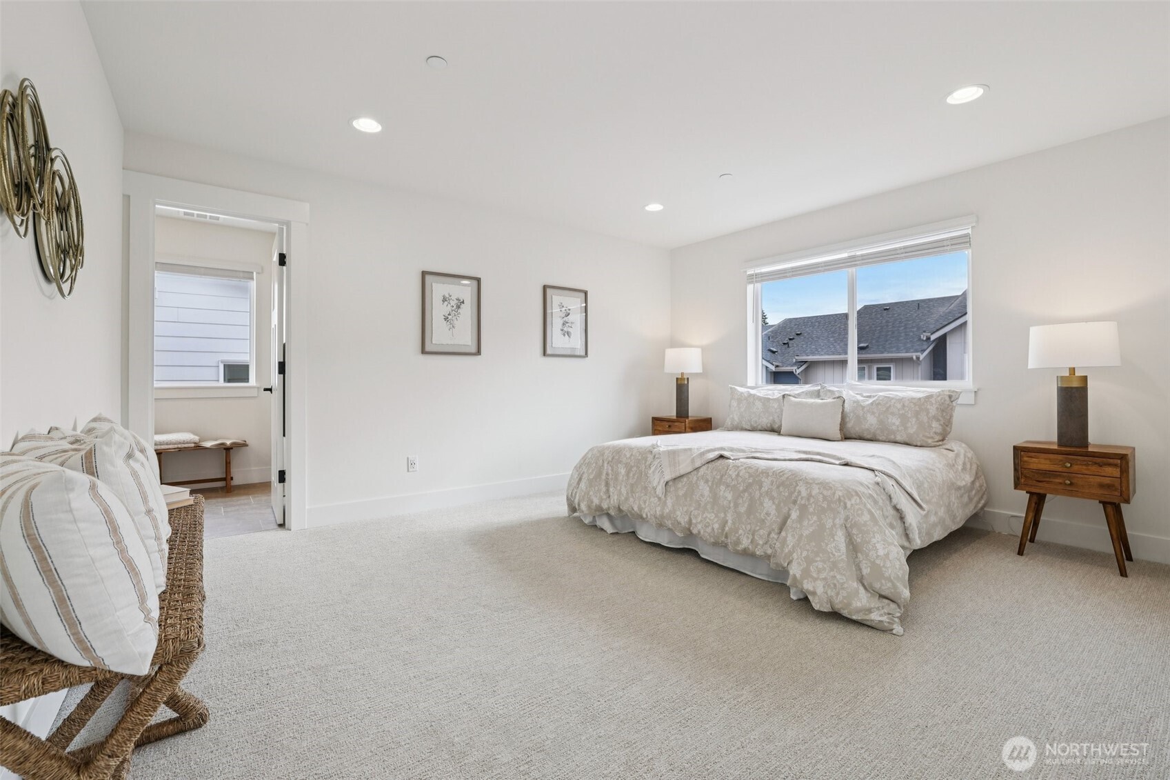 14 160th Place Southeast Bothell, WA 98012 - Photo 18 of 39 a spacious bedroom with a bed a couch and dresser