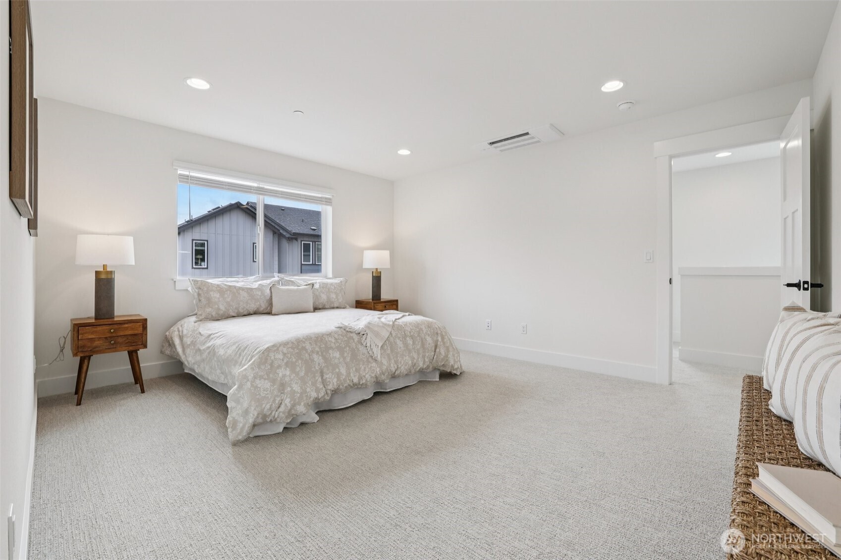 14 160th Place Southeast Bothell, WA 98012 - Photo 19 of 39 a bedroom with a bed and a chair