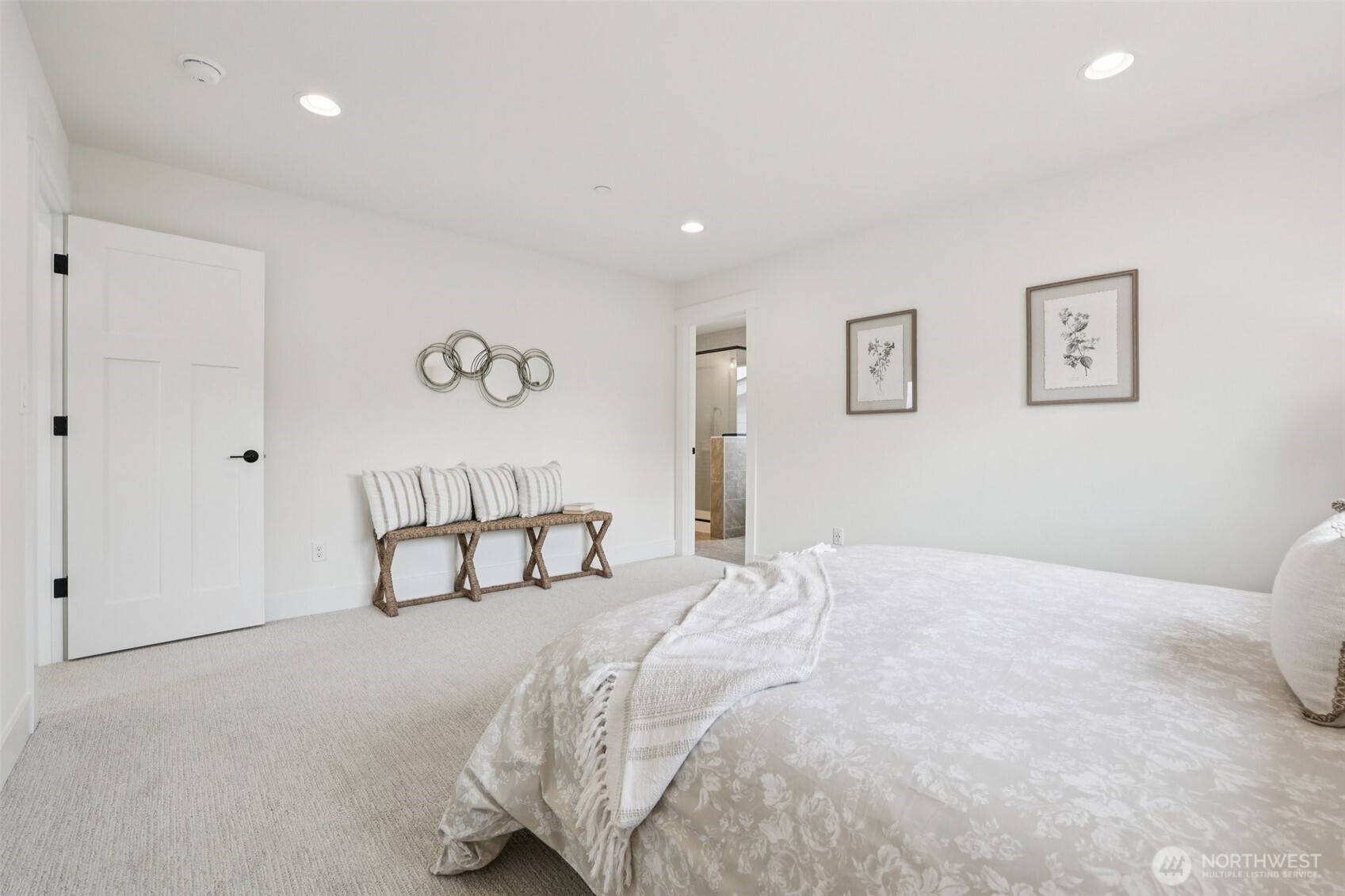 14 160th Place Southeast Bothell, WA 98012 - Photo 20 of 39 a spacious bedroom with a bed and a couch