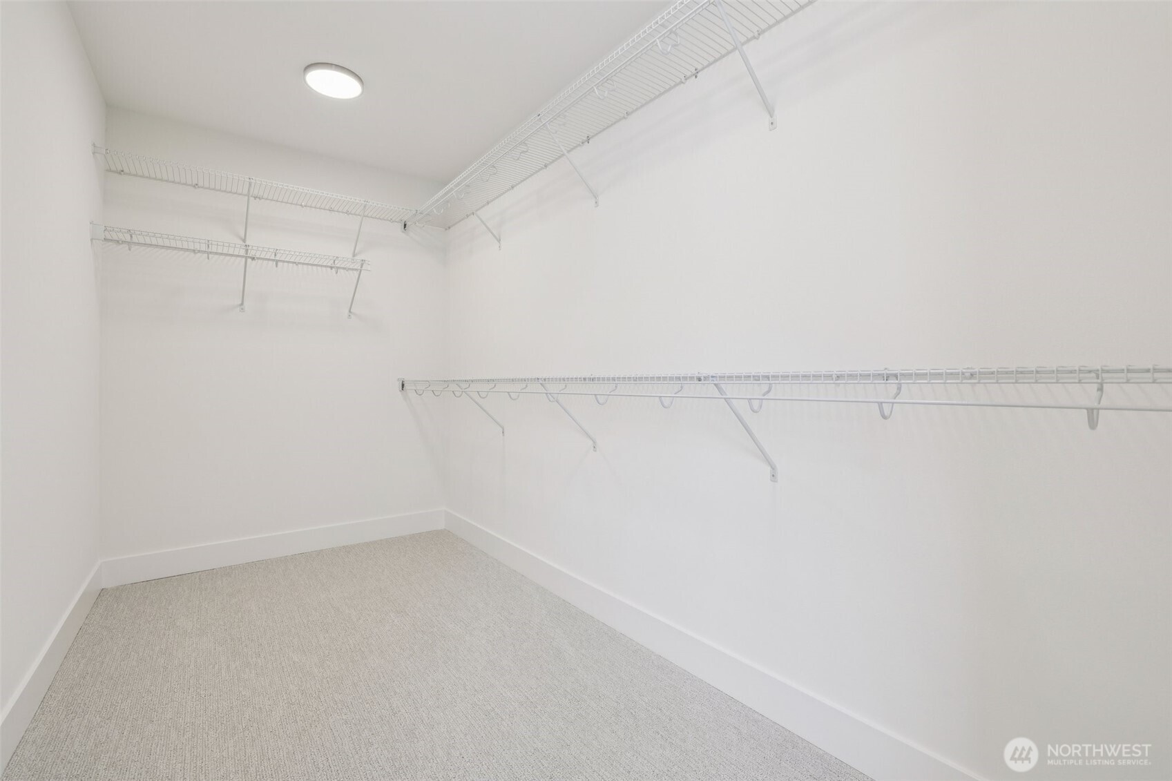 14 160th Place Southeast Bothell, WA 98012 - Photo 25 of 39 a view of a room with racks on the wall