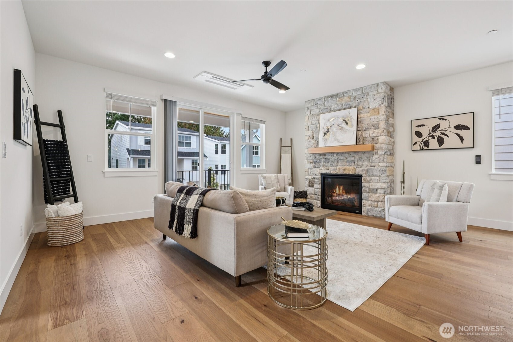 14 160th Place Southeast Bothell, WA 98012 - Photo 4 of 39 a living room with furniture and a fireplace
