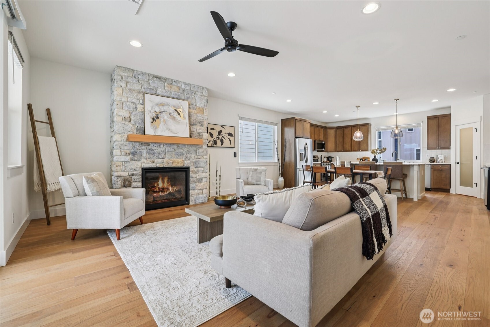 14 160th Place Southeast Bothell, WA 98012 - Photo 5 of 39 a living room with furniture and a fireplace