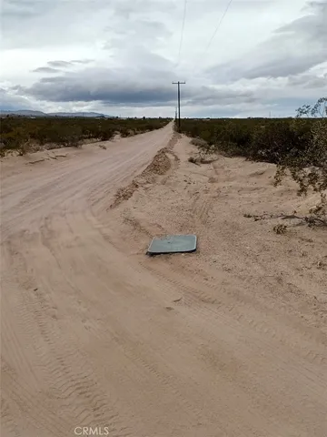 a view of a beach with a ocean
