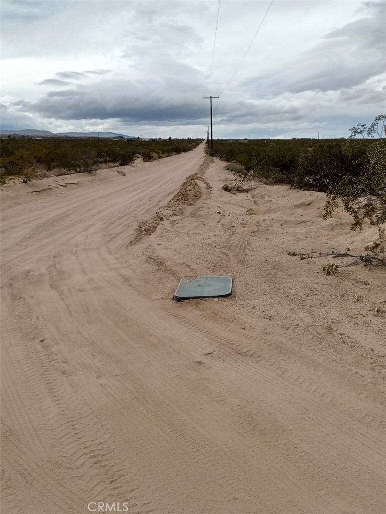 a view of a beach with a ocean