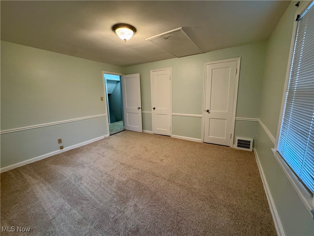 1316 Gordon Road Lyndhurst, OH 44124 - Photo 24 of 36 Bedroom #2, fresh paint, new carpet, two closets, access to attic.