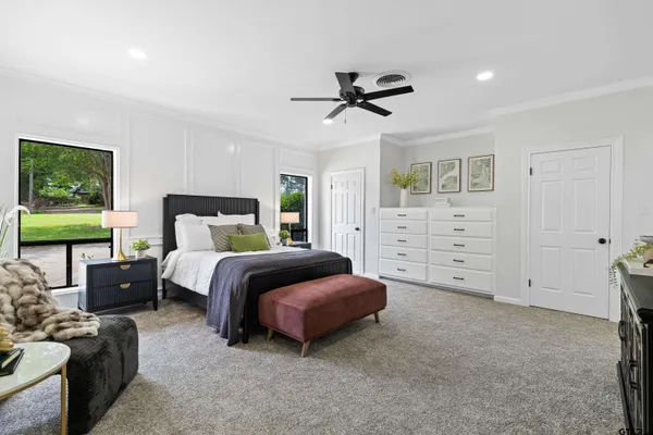 a bedroom with a bed and a cabinets