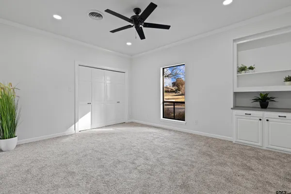 a view of an empty room and window