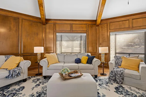 a living room with furniture and a window