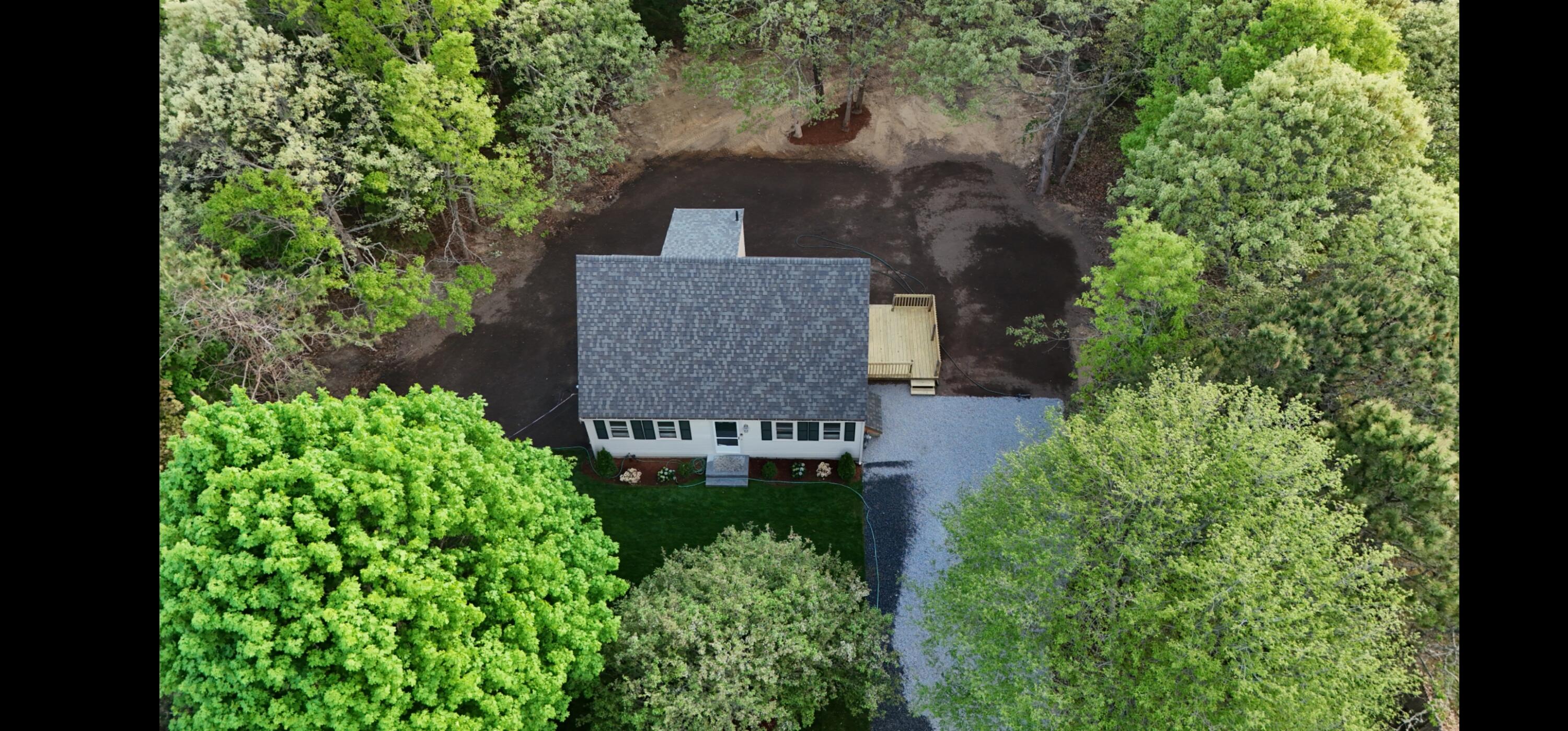 147 Chippingstone Road Marstons Mills, MA 02648 - Photo 23 of 23 an aerial view of a house by greenery space