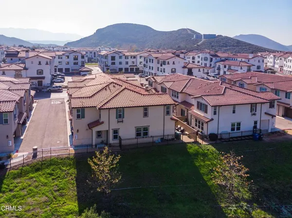 an aerial view of a house with a garden