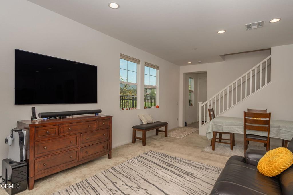 231 Inspiration Camarillo, CA 93012 - Photo 11 of 47 a living room with furniture and a flat screen tv