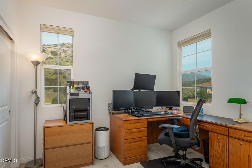231 Inspiration Camarillo, CA 93012 - Photo 17 of 47 a view of a workspace with furniture and a window