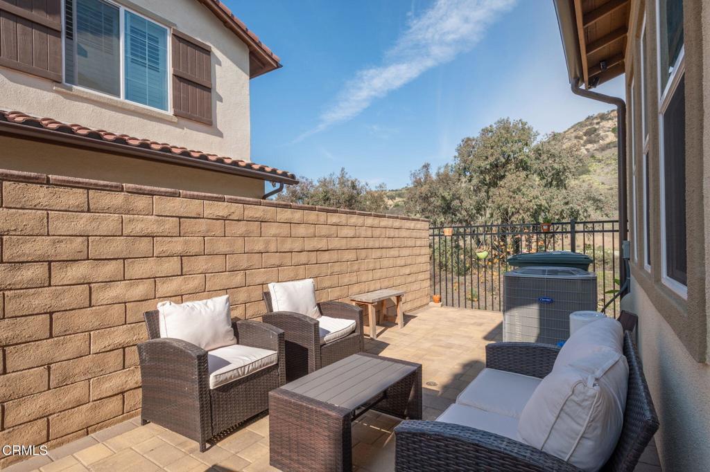 231 Inspiration Camarillo, CA 93012 - Photo 21 of 47 a view of a patio with couches and a fire pit