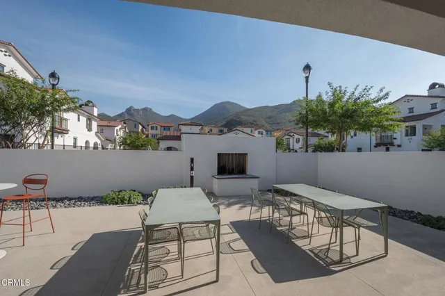 a view of a terrace with furniture