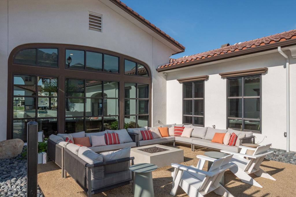 231 Inspiration Camarillo, CA 93012 - Photo 31 of 47 a view of a patio with couches table and chairs and potted plants