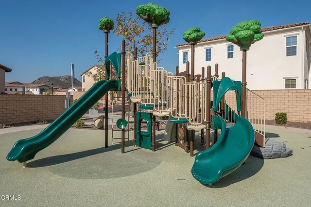 a view of a house with a park