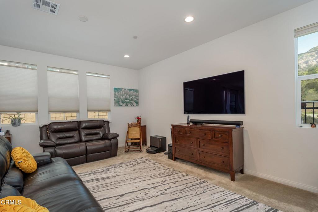 231 Inspiration Camarillo, CA 93012 - Photo 9 of 47 a living room with furniture and a flat screen tv