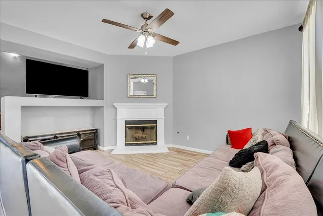 a bedroom with a bed and a television