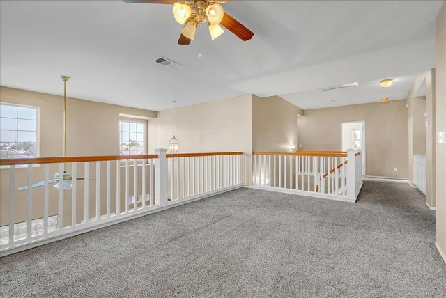 a view of a hallway with a projector space