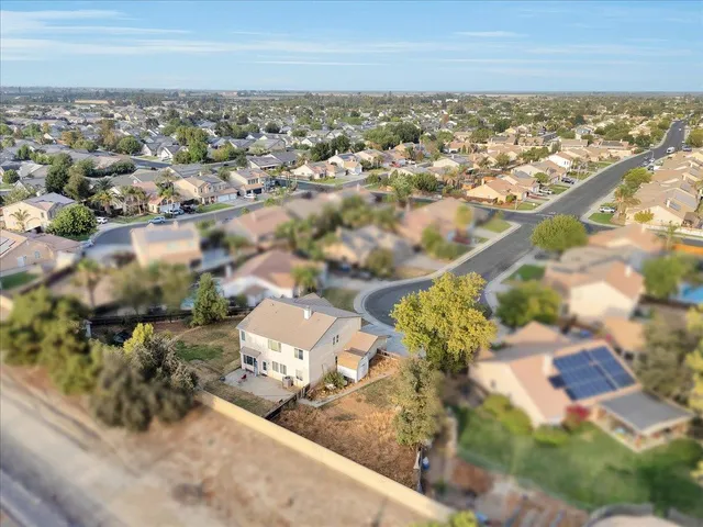 an aerial view of a city with lots of residential buildings