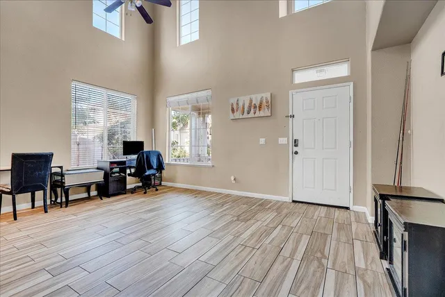 a view of livingroom with hardwood floor and furniture