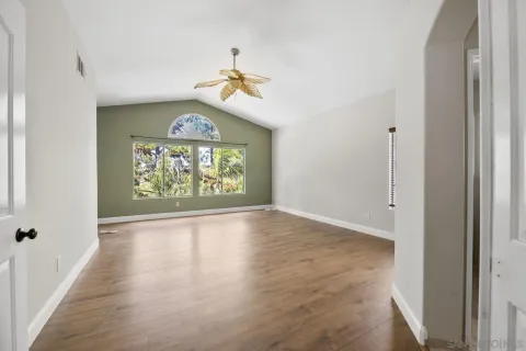 a view of an entryway with a hallway