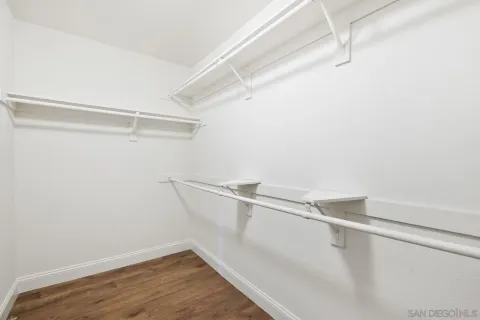 a view of a room with racks on the wall