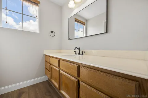 a utility room with sink dryer and washer
