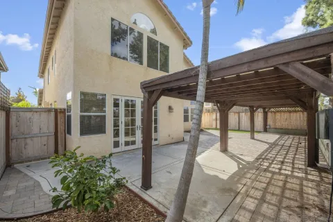 a front view of a house with a glass windows