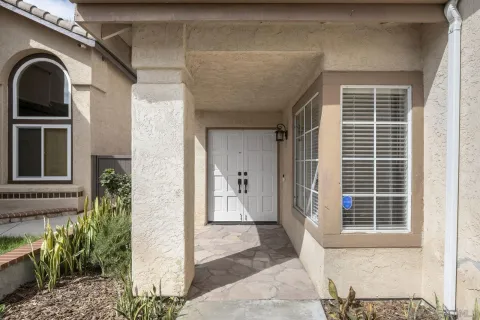 a front view of a house with a porch