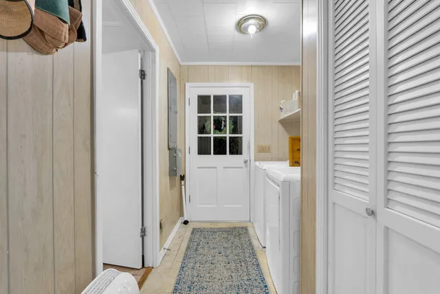 a bathroom with a tub and shower