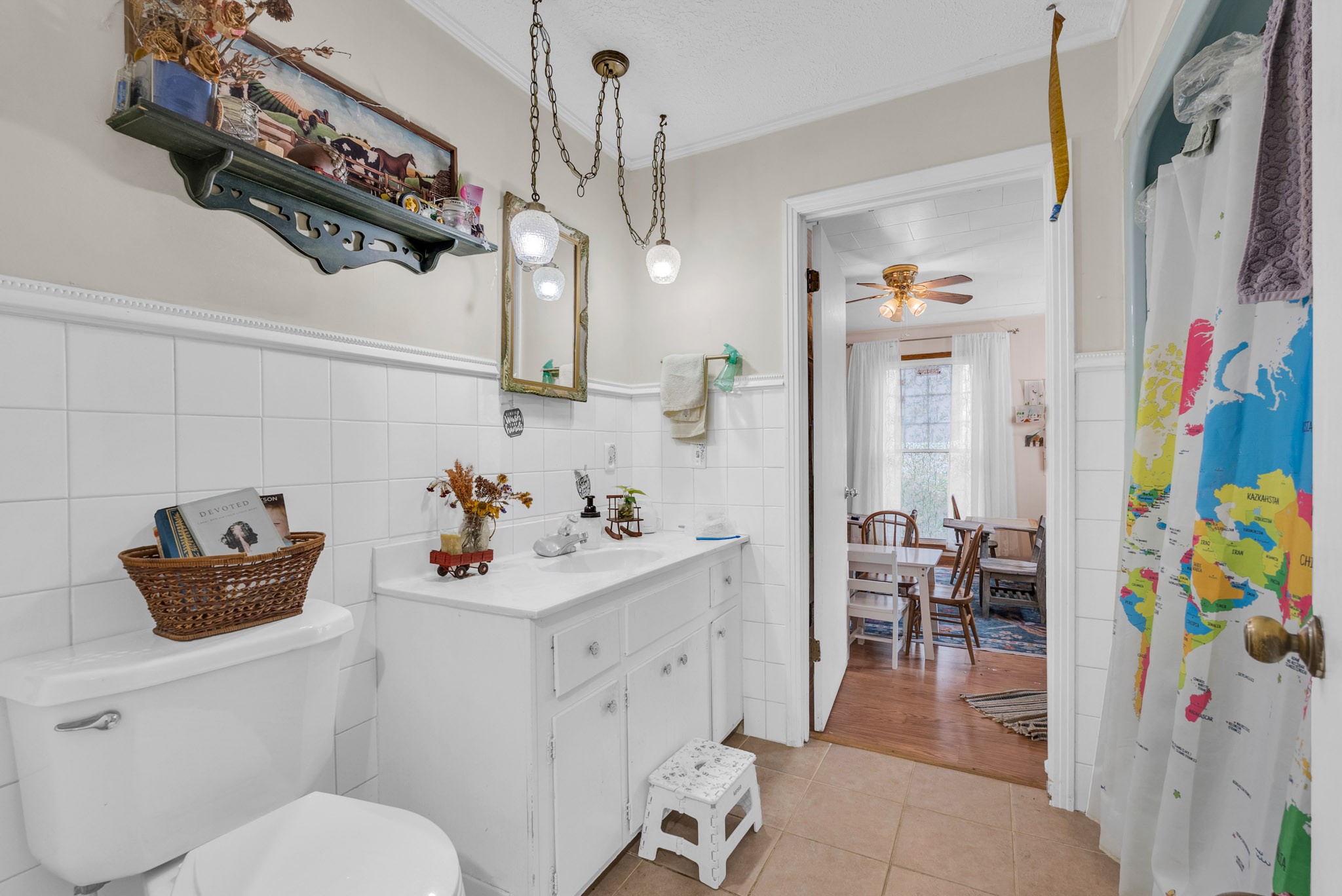 5881 Burgess Falls Road Sparta, TN 38583 - Photo 20 of 29 a bathroom with a sink a toilet and shower curtain