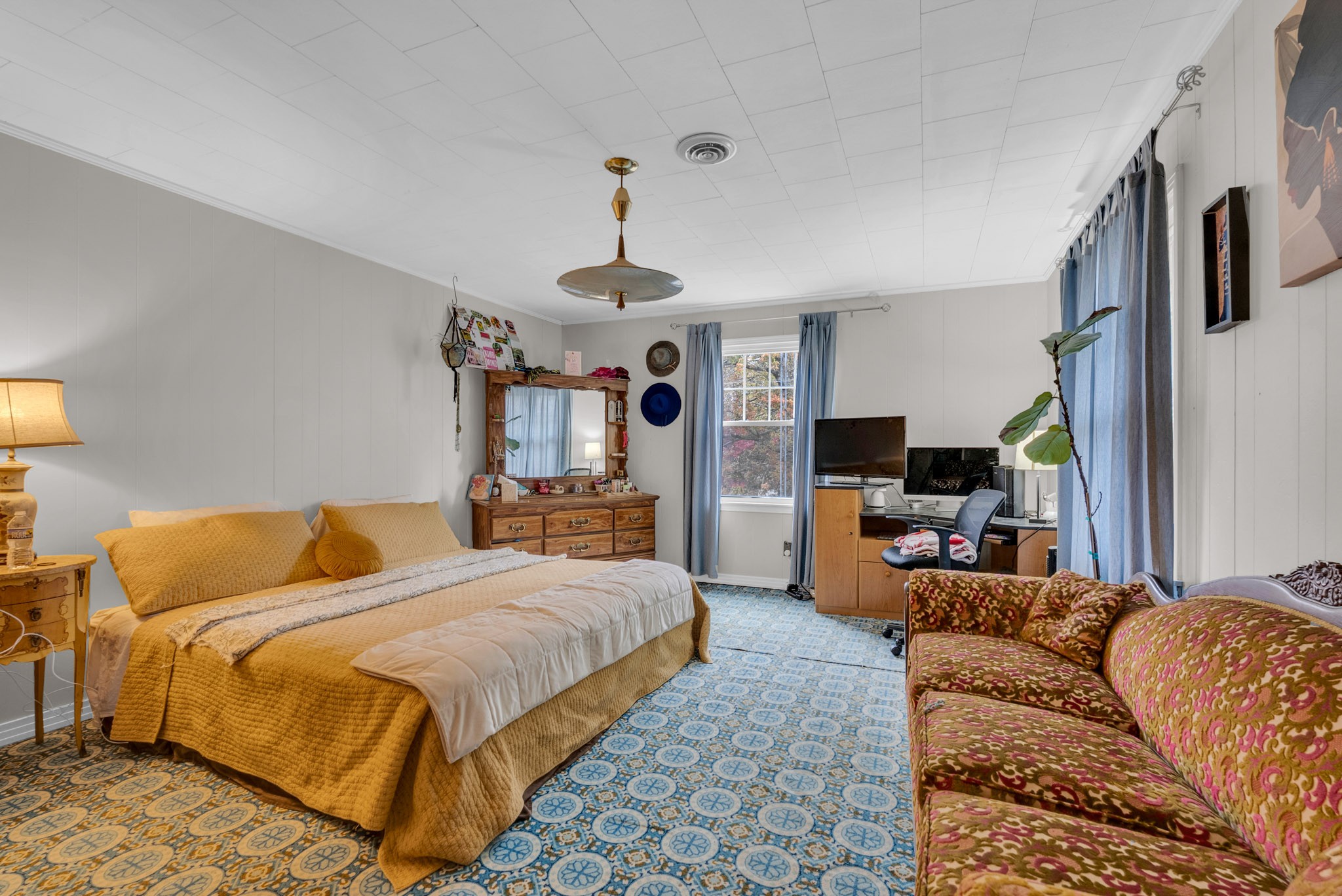 5881 Burgess Falls Road Sparta, TN 38583 - Photo 22 of 29 a bedroom with a bed couch and a window